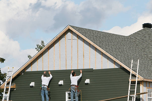 Professional Siding Contractor technician working in Aultman, PA